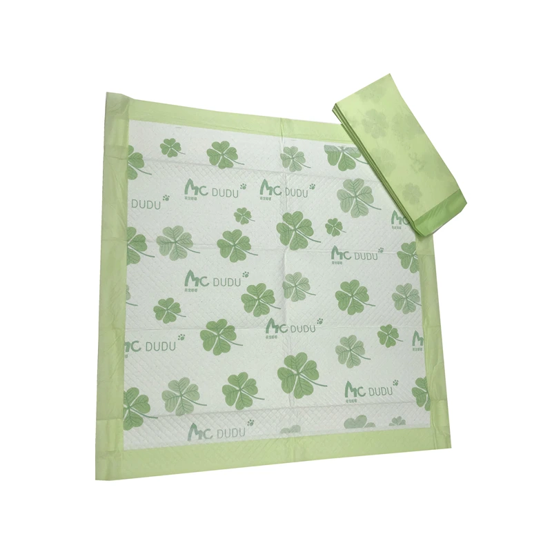 Wholesale custom pattern dog pads with a stack of folded printed training pads - Honway Pet Factory